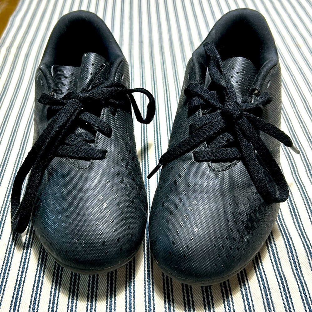 Black adidas cleats